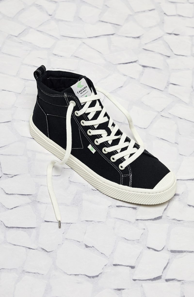 oca high black canvas sneaker women front three quarter view.feature 3 d9d99e37 336c 462a 8cfd f4ba04726d1b