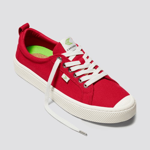 oca low red canvas sneaker side view.fb feed