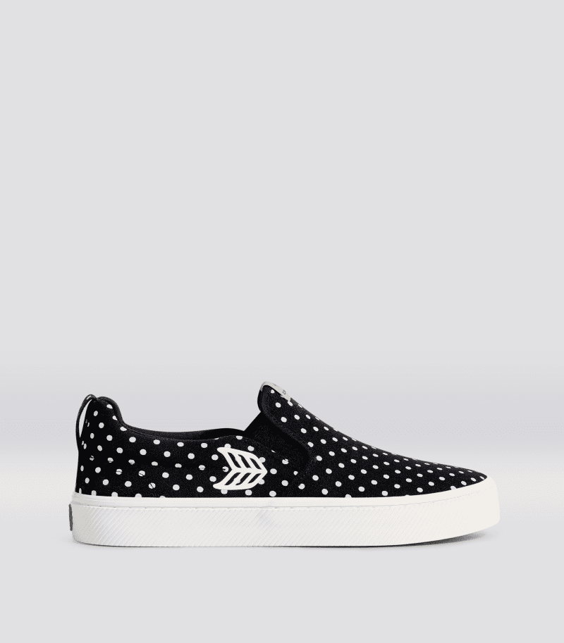 slip on black polka dots canvas sneaker.side view